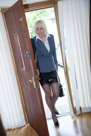 Older MILF Jan Burton strips off business clothes after a hard day at office on girlsfollowers.com
