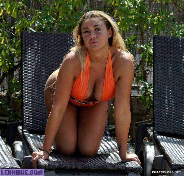 Leaked Reality Star Ellie Young Shows Off Great Cleavage In A Orange Swimsuit on girlsfollowers.com