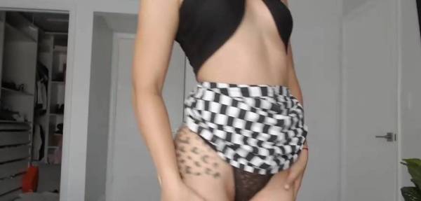 Beautiful curly bitch Xoleelee in a skirt posing for the camera on girlsfollowers.com